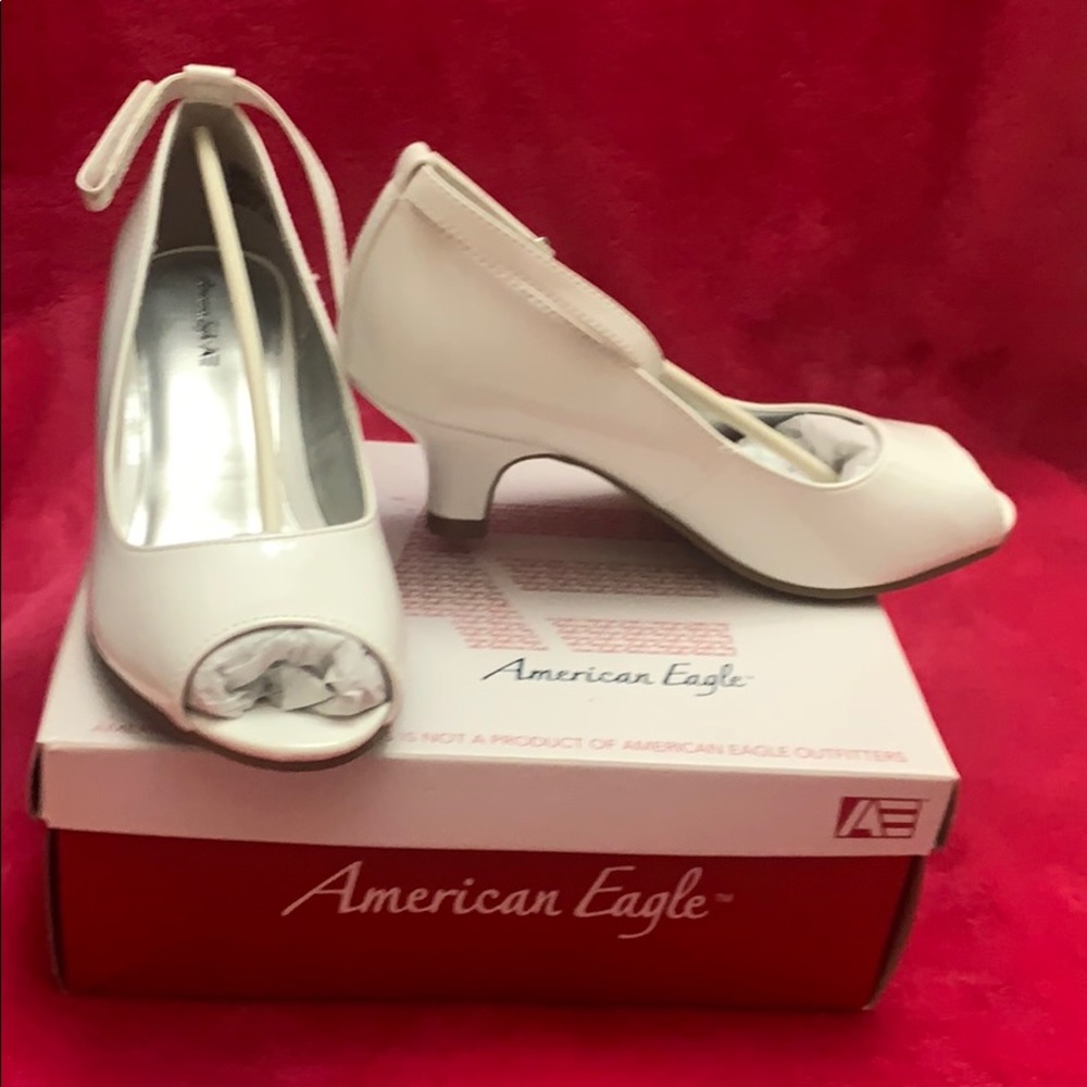 A pair of, never worn, American Eagle shoes.